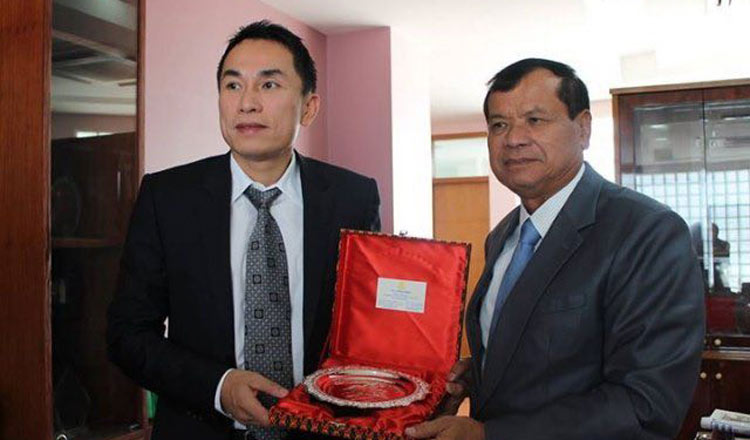 The donation was made possible through the support of businessman Gordon Tang, who is seen here with Tourism Minister Thong Khon.