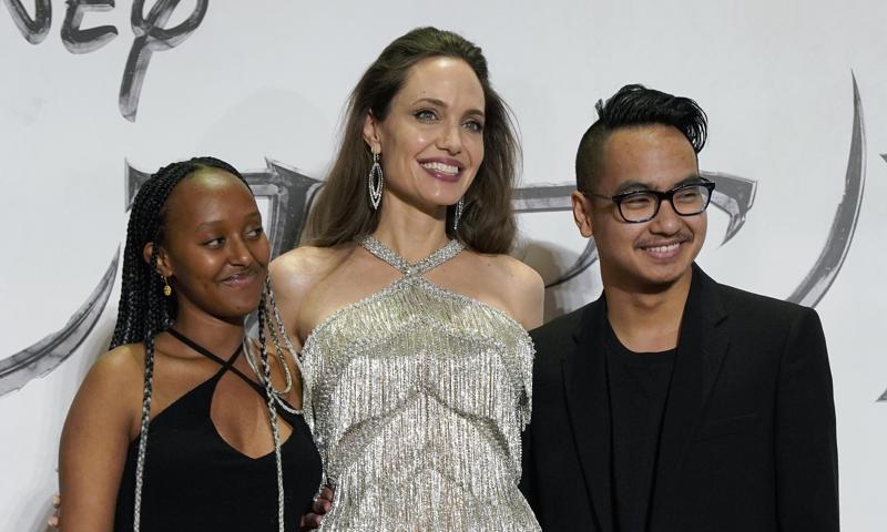 Angelina’s son Maddox, seen here with his mom and younger sister Zahara, was born in Cambodia