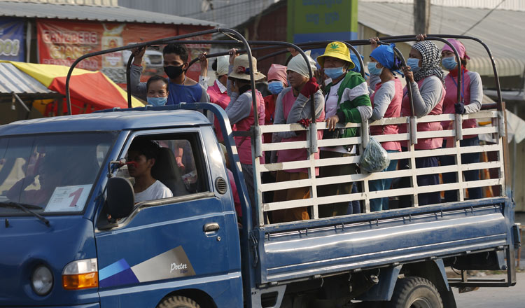 A truck transports a group of workers in Phnom Penh. KT/ Siv Channa